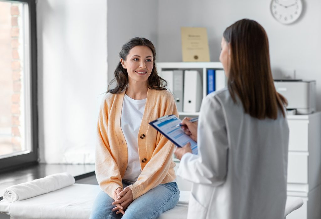 Woman talking to a general practitioner