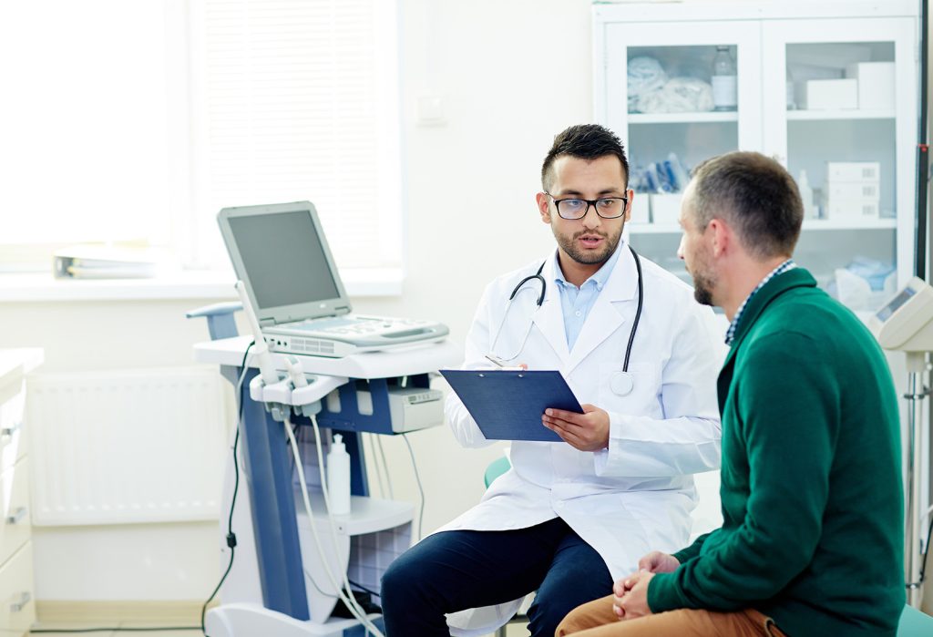 Doctor talking with a patient
